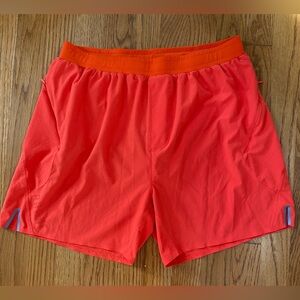 Rhone mens shorts. Size medium and color orange.